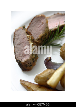 Slow Roasted Pork Chop mit Fenchel und Knoblauch Kartoffeln Stockfoto