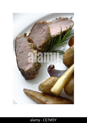 Slow Roasted Pork Chop mit Fenchel und Knoblauch Kartoffeln Stockfoto