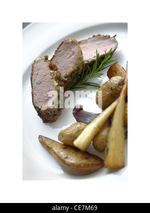 Slow Roasted Pork Chop mit Fenchel und Knoblauch Kartoffeln Stockfoto