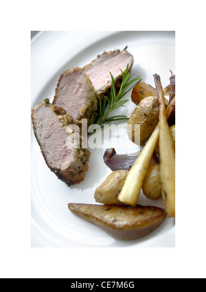 Slow Roasted Pork Chop mit Fenchel und Knoblauch Kartoffeln Stockfoto