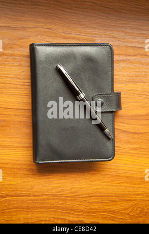 Filofax und Stift Stockfoto