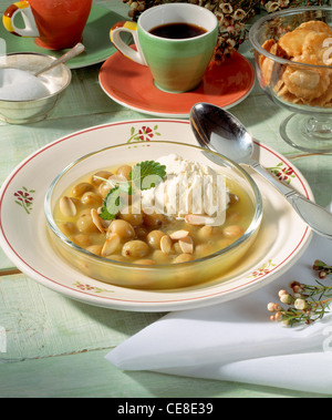 Stachelbeere Porridge mit Vanille-Eis Stockfoto
