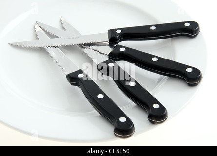 Steakmesser Edelstahl auf weiß Stockfoto