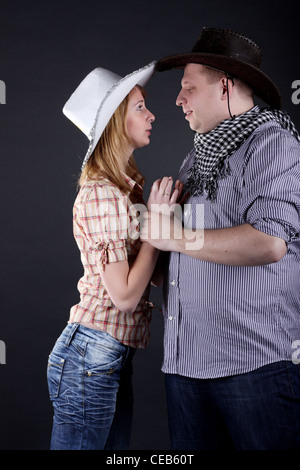 Schöne junge Paar auf dem weißen Hintergrund isoliert Stockfoto