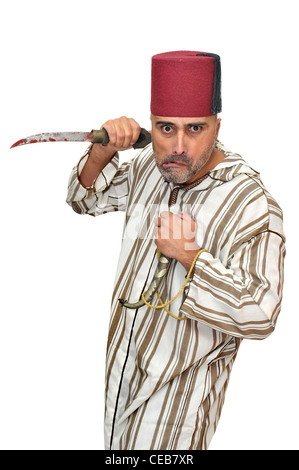 Arabischer Mann mit einem Dolch lustige Grimassen isoliert in weiß Stockfoto