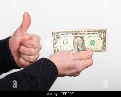 ein US-Dollar in der hand Stockfoto