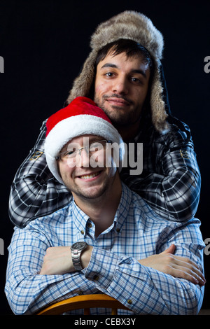 Porträt von zwei Männer sitzen Stockfoto
