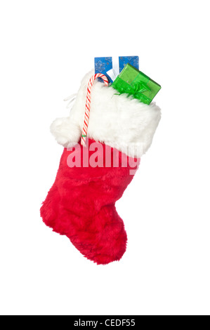 Ein Weihnachts-Strumpf mit Strumpf Stuffer präsentiert isoliert auf weiss. Stockfoto