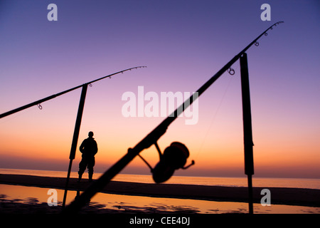 Fischer am Strand Angel Sonnenuntergang Noordwijk Holland Europa Stockfoto