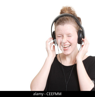 Frau Musik hören Stockfoto
