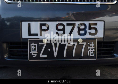 dh TRANSPORT HONG KONG Auto zwei Kennzeichen mit Hong Kong und China Registrierung chinesische Nummern Platten Autos Stockfoto