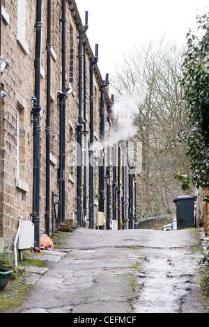 Pennine Reihenhäuser in West Yorkshire Stockfoto