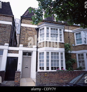 Erkerfenster auf herkömmlichen Doppelhaushälfte Londoner Stadthaus Stockfoto