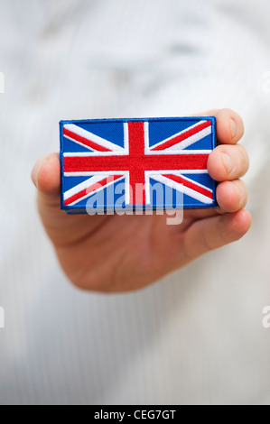 Hand mit einem Union Jack Flagge gestickt patch Stockfoto