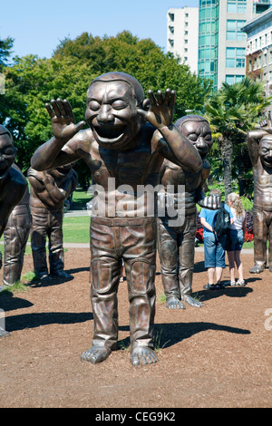 'A-Labyrinth-Ing Lachen' Statuen von Yue Minjun in Vancourver, Britisch-Kolumbien, Kanada Stockfoto