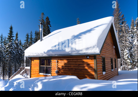 Blockhaus im Winter. Stockfoto