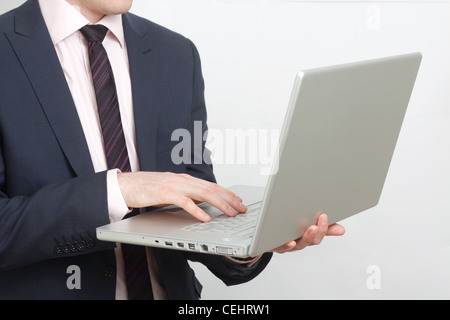 Business-Mann mit laptop Stockfoto