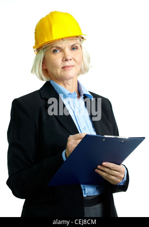 Porträt von Ernst Geschäftsfrau im Helm Blick in die Kamera Stockfoto