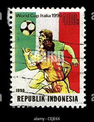 Indonesien-ca. 1990:A Stempel gedruckt in Indonesien zeigt Bild von der WM 1990 war die 14. FIFA World Cup, die alle vier Jahre stattfindenden internationalen Fußball World Championship Turnier circa 1990. Stockfoto