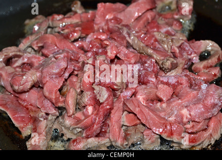 Rindfleisch-Wok Kochen in Pfanne anbraten Stockfoto