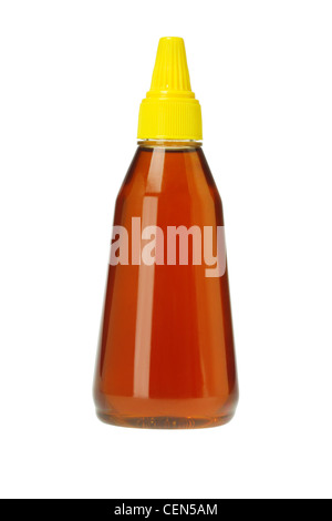 Kunststoff-Flasche Honig auf weißem Hintergrund Stockfoto