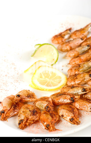 gegrillte Garnelen mit Zitrone und Limette closeup Stockfoto