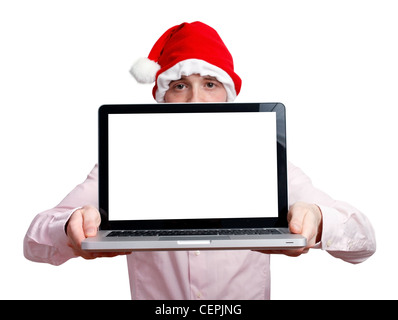 Geschäftsmann mit Weihnachtsmütze und computer Stockfoto