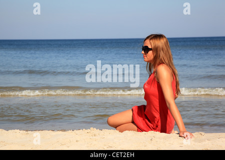 Frau am Strand Stockfoto