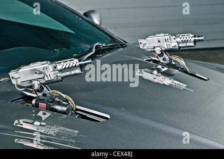 Maschinengewehre auf Aston Martin DB5, James Bond Oldtimer Stockfoto