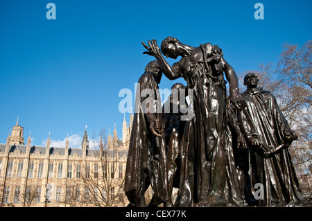 Die Bürger von Calais von Auguste Rodin und Houses of Parliament, London, UK Stockfoto