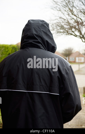 Unerwünschte Zeichen Schurken Hoodie verdächtig Modell veröffentlicht Stockfoto