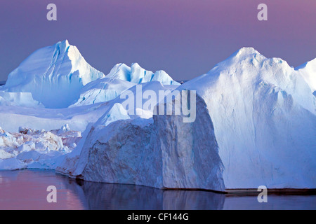 Eisberg bei Sonnenuntergang in die einem Eisfjord, Disko-Bucht, West-Grönland, Grönland Stockfoto