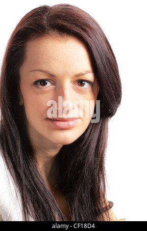 Studio-Porträt von einem schönen 20 jährige Brünette gegen weiß. Stockfoto