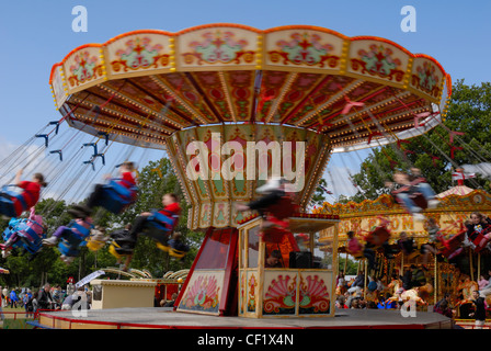 Eine traditionelle Schaukel Stuhl Fahrt mit der Kent County Show in Bewegung. Stockfoto