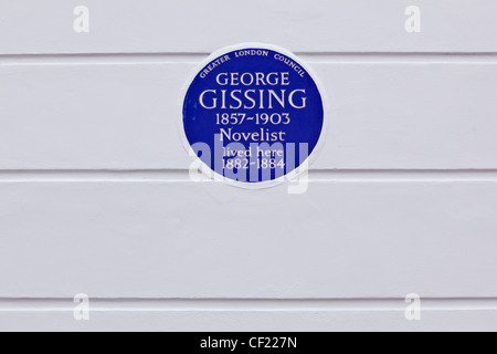 Eine größere London Council (GLC) Tafel an der Wand 33 Oakley Gärten feiern, dass Schriftsteller George Gissing lebte in der hou