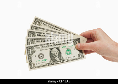 Fünf 1 US-Dollar-Scheine in die Hand, weißen Hintergrund gehalten werden Stockfoto