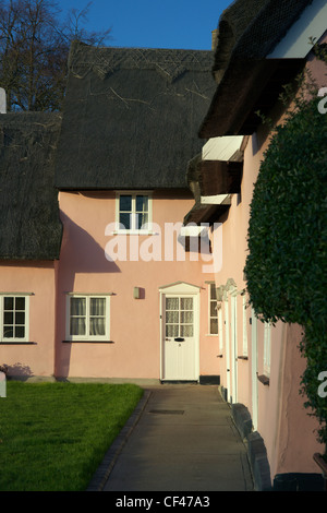 Eine traditionelle Suffolk Rosa Hütte in Cavendish. Stockfoto