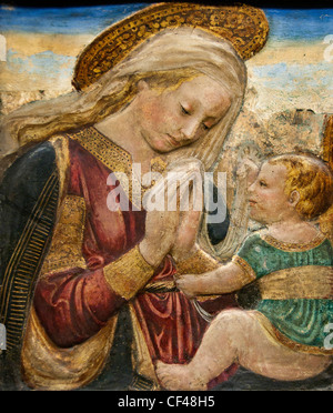 Die Jungfrau Maria, die das Kind Jesus Christus anbetet Stucco Paint von Desiderio da Settignano 1430 - 1464 1427 - Florenz Italien Italienisch Stockfoto