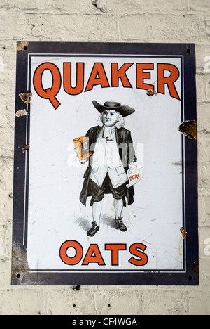 Eine alte Quaker Oats Werbung auf Tin Plaque. Stockfoto