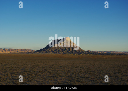 Erste Sonne Morgenlicht an Fabrik Butte, Utah Stockfoto