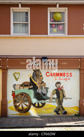 Eine alte Guinness Werbung Wandbild. Stockfoto