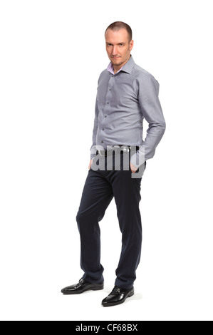 Erfolgreicher Geschäftsmann im Hemd, in voller Länge Portrait isoliert auf weiss Stockfoto
