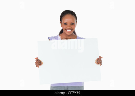 Frau Holding Platzhalter in ihr Hände auf weißem Hintergrund Stockfoto