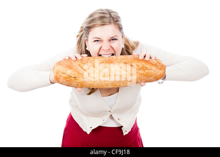 Hungrige Frau halten und Bissen Brot, isoliert auf weißem Hintergrund. Stockfoto