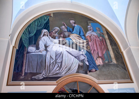 Symbol mit St. Tabitha geheilt von St. Peter im russischen Kloster des Apostels St. Peter in Jaffa, Israel Stockfoto