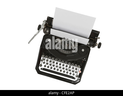 Vintage Schreibmaschine mit leerem Papier isoliert auf weiss. Stockfoto