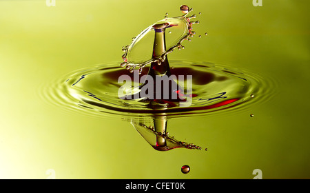 Spritzwasser in grün Stockfoto