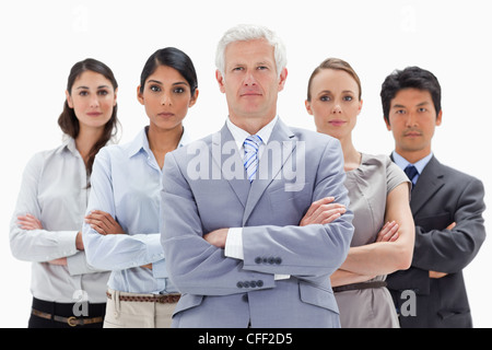 Ein multikulturelles Team hinter ihren Chef in einem niedrigen Winkel Schuss in Nahaufnahme Stockfoto