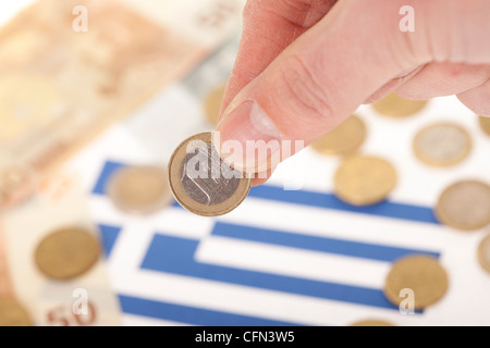 Mann-Euro-Münze für die Volkswirtschaft zu investieren Stockfoto