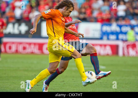 26. August 2012. Pamploma, Spanien. Osasuna 1-2 FC Barcelona, FC Barcelonas Carles Puyol in Aktion während der spanischen Liga-Spiel zwischen Osasuna und FC Barcelona Stadium Reyno de Navarra gespielt. Stockfoto